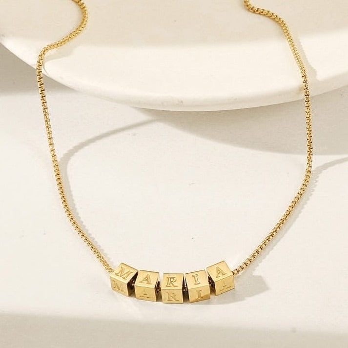 Durable and stylish, our waterproof necklace is crafted for both functionality and fashion. Perfect for any occasion, it's the ideal accessory for those who appreciate durability and timeless elegance. Perfect for the minimalist and a beautiful piece to layer with. A true versatile statement piece that you can wear straight from the pool to dinner! - 18K gold plated / stainless steel - Waterproof technology - 18" in length - Necklace + 1 cube (initial or sign) = $45 - Additional cubes with lette Waterproof Necklace, Length Necklace, The Minimalist, Initial Necklace, Ring Necklace, Statement Pieces, Anklets, Ring Earrings, Necklaces Bracelets