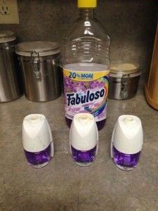 three bottles of fabuloso sitting next to each other on a counter top