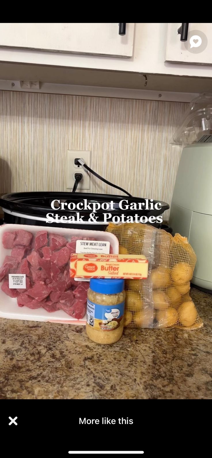 some meat and potatoes are on the counter in front of a crockpot garlic steak & potatoes