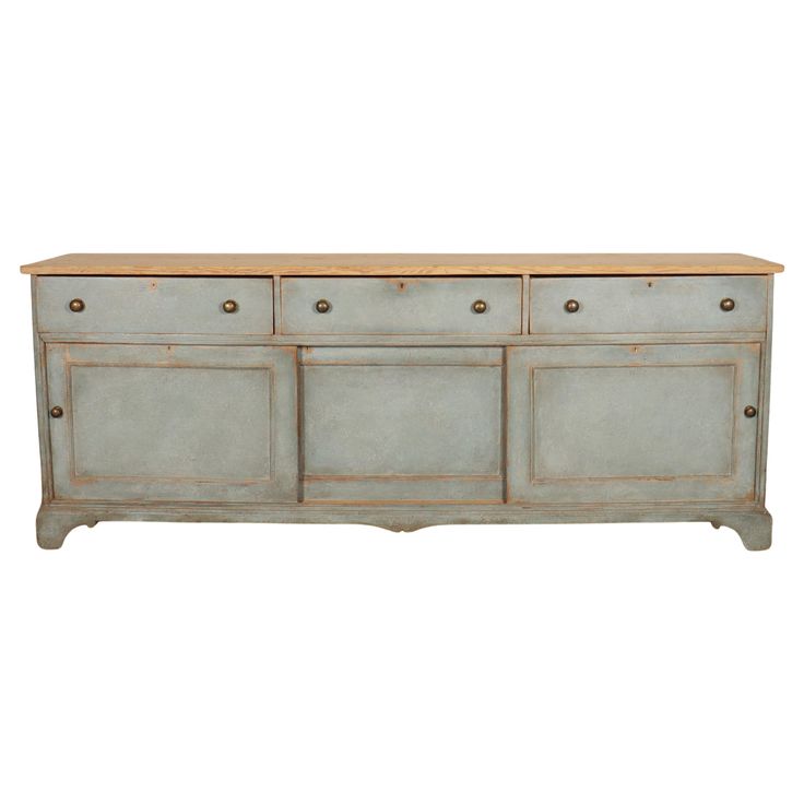 the sideboard has three drawers and two doors