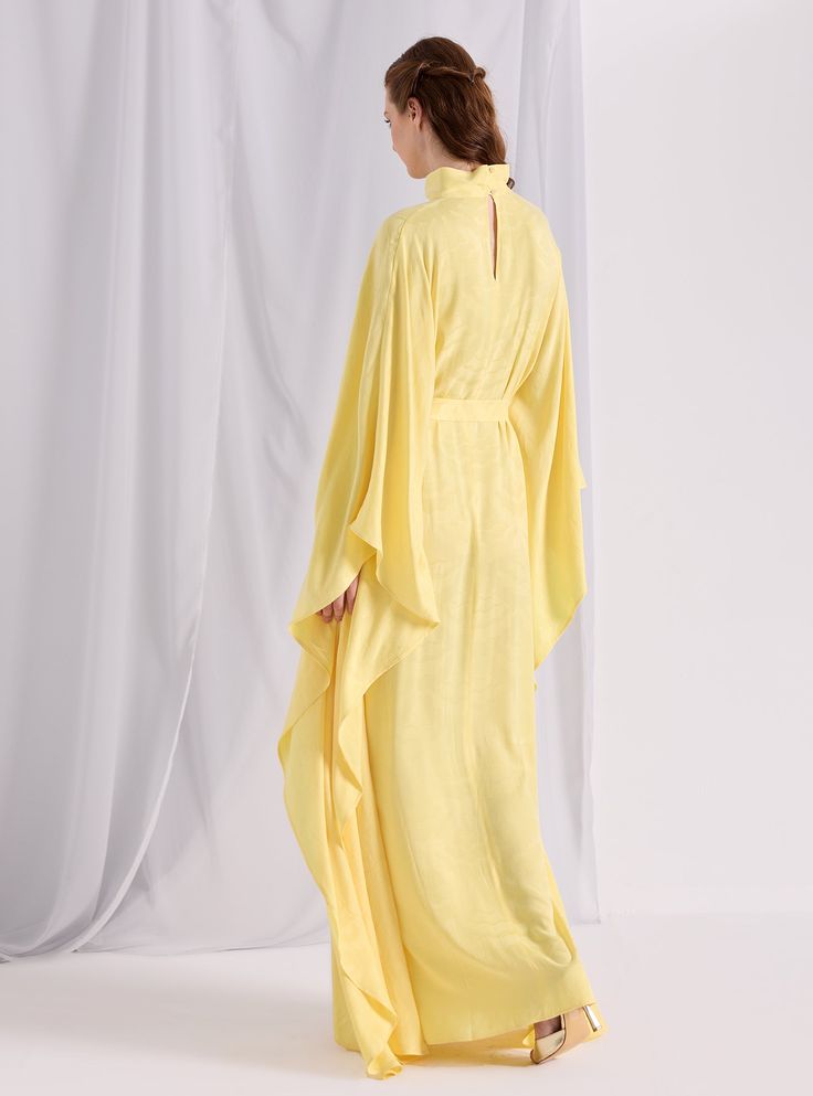 Model height: 177 CM 100% Viscose Length: 140cm Fitted Maxi Length Kaftan For Evening, Festive Chic Maxi Length Dresses, Festive Chic Maxi Dresses, Spring Evening V-neck Kaftan, Chic Long Kaftan For Spring, Elegant Yellow Silk Kaftan, Chic Long Spring Kaftan, Formal Long Sleeve Summer Gown, Silk Dresses With Kimono Sleeves