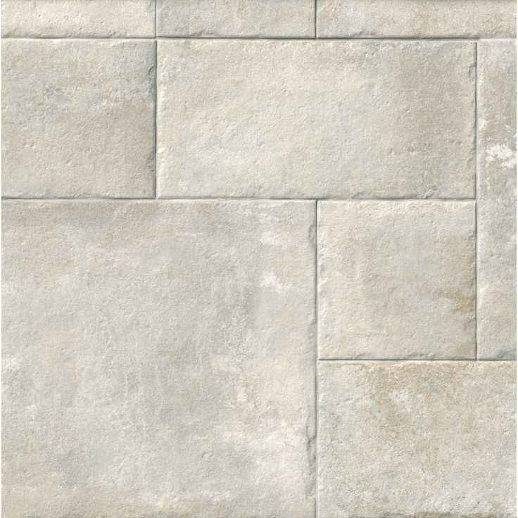 an image of a stone wall that looks like it is made out of white bricks