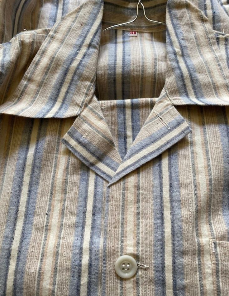 Vintage deadstock French flannel cotton pyjama shirt top only Stamped H M C 1940s new old stock Deadstock and unworn unlaundered and unpacked for the first time to photograph them. Circa 1940s.  Made from soft cotton flannel in muted stripes.  I've 2 models only now available  blue/brown stripes and blue/white stripes... see photos These are unwashed and unworn deadstock  - they are being sold as found in order to retain their deadstock state.   May have few faint storage marks, and they are  cr Cotton Camp Collar Top With Vertical Stripes, Cotton Top With Vertical Stripes And Camp Collar, Vertical Stripes Cotton Top For Loungewear, Cotton Tops With Vertical Stripes For Loungewear, Striped Cotton Shirt For Loungewear, Retro Long Sleeve Cotton Sleepwear, Cotton Tops With Vertical Stripes And Spread Collar, Pjs Shirt, French Stripes