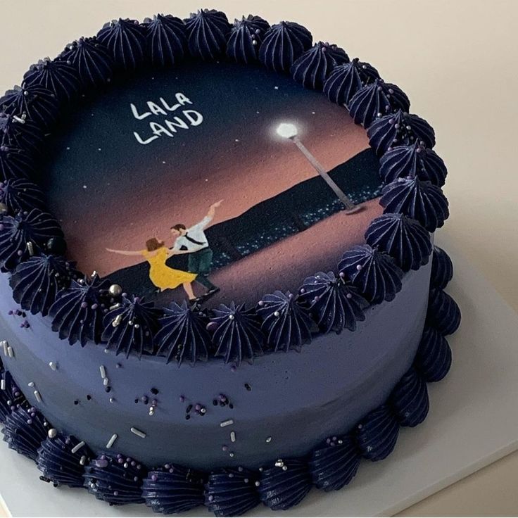 a cake with an image of a woman on it and the words lana land written on top