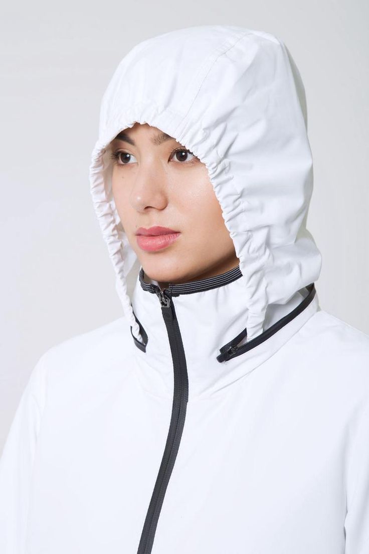 White Waterproof Outerwear For Outdoor, Functional White Windproof Outerwear, Urban White Windbreaker With Detachable Hood, White Urban Windbreaker With Detachable Hood, Functional White Nylon Outerwear, Functional Windproof Outerwear For Light Sports, Breathable Nylon Hooded Outerwear, Breathable Hooded Nylon Outerwear, Nylon Outerwear For Winter Light Sports