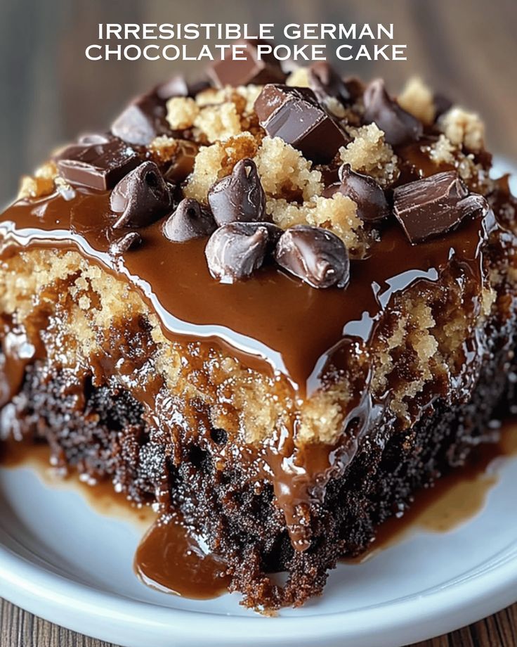 a piece of cake with chocolate icing and crumbs on it sitting on a white plate