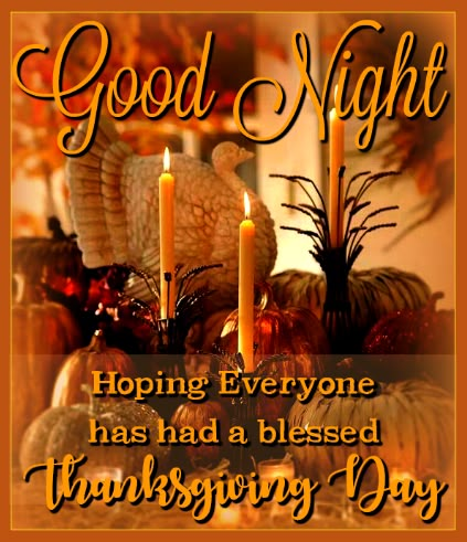 a thanksgiving card with candles and pumpkins in the center, saying good night hoping everyone has had a blessed thanksgiving day