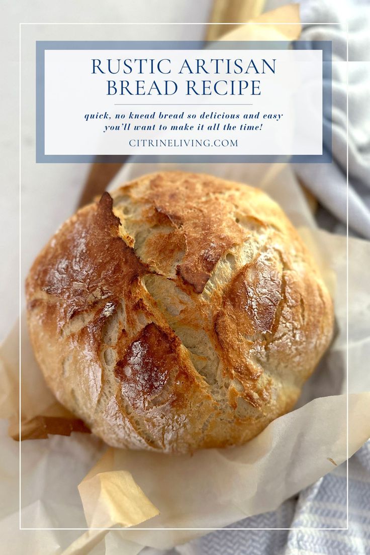 a close up of a loaf of bread on top of wax paper with the words rustic artisan bread recipe