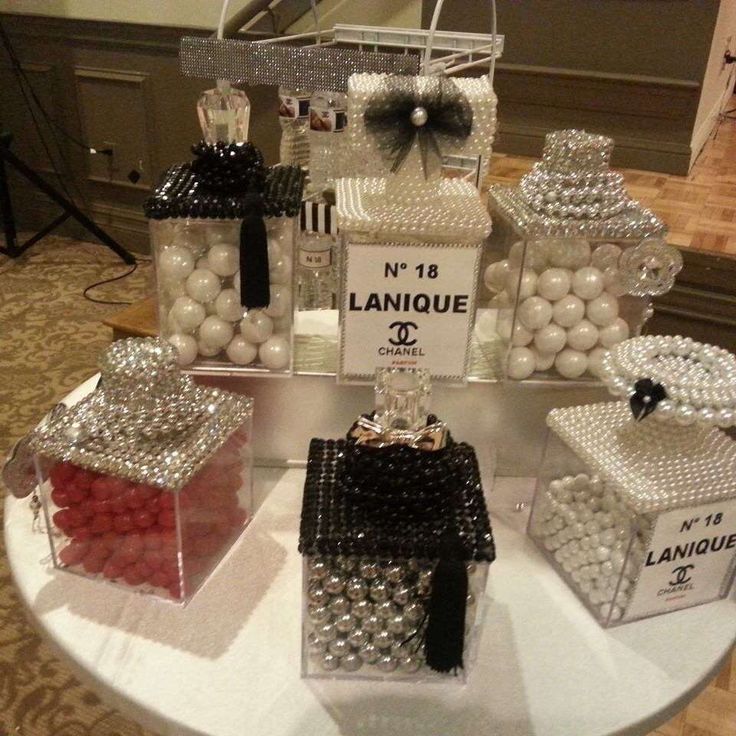 a table topped with boxes filled with different types of candies