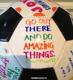 a soccer ball with words written on it and the word go out there and do amazing things