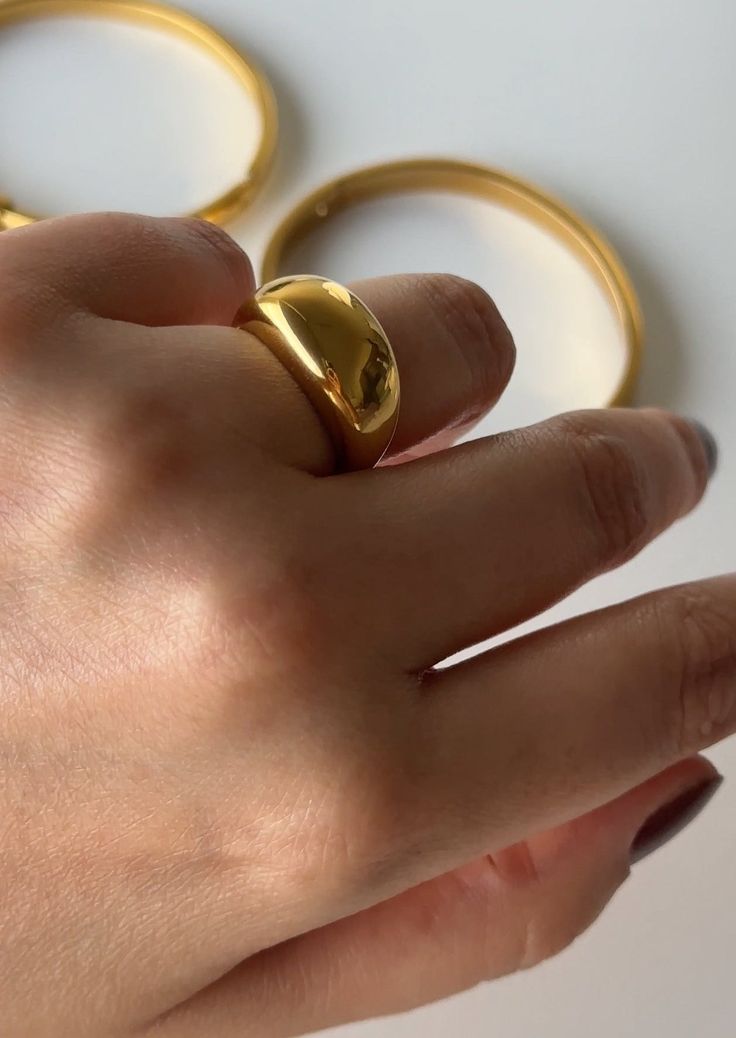 Our dome ring is the perfect way to make a unique statement. Bold and eye-catching, it's the perfect accessory to spice up any outfit. Dome Ring, Domed Ring, Ring Gold, Spice Up, Spice Things Up, Gold Rings, 18k Gold, Gold Plate, Plating