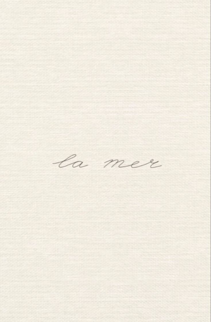 the words be me are written in cursive handwriting on a white paper background