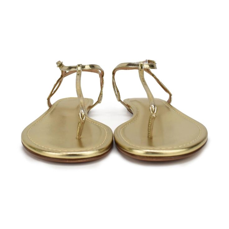 Aquazzura thong sandals in gold metallic leather with curved detail and buckle closure in gold hardware. Please note that shoes are different sizes, see details below. Includes dust bag. Brand = Aquazzura Condition = 10/10, Brand new without box Size = Right shoe: 35.5 EU, Left shoe: 36 EU Material = Leather Hardware = Gold SKU = 22806-7 Gold Sandals With Gold-tone Hardware And Single Toe Strap, Designer Gold Sandals For The Beach, Gold T-strap Sandals With Removable Insole, Formal Sandals With Gold-tone Hardware And Single Toe Strap, Gold Leather Toe Ring Sandals With Ankle Strap, Gold Leather T-strap Sandals With Buckle, Gold Sandals With Buckle And Single Toe Strap, Elegant Gold T-strap Sandals For Beach, Gold Toe Ring Sandals