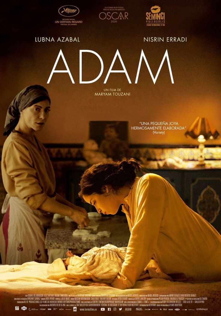 the movie poster for adam, starring two women in bed and one is holding a baby