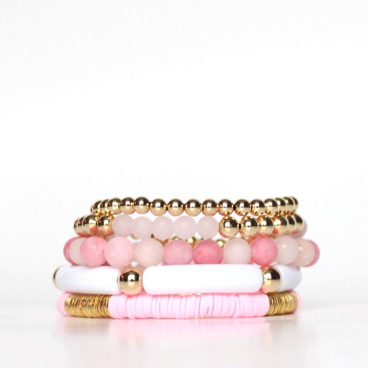 Pink and gold beaded stretch bracelet stack | ELLIOT LANE – Elliot Lane Pink Trendy Hand-strung Stretch Bracelet, Trendy Pink Hand-strung Stretch Bracelet, Pink Hand-strung Heishi Beads Friendship Bracelets, Hand-strung Pink Bracelets For Everyday Wear, Trendy Pink Heishi Beads Stretch Bracelet, Everyday Pink Hand-strung Bracelets, Pink Heishi Beads Bracelets With Colorful Beads, Pink Heishi Beads Bracelet With Colorful Beads, Trendy Pink Heishi Beads Friendship Bracelet