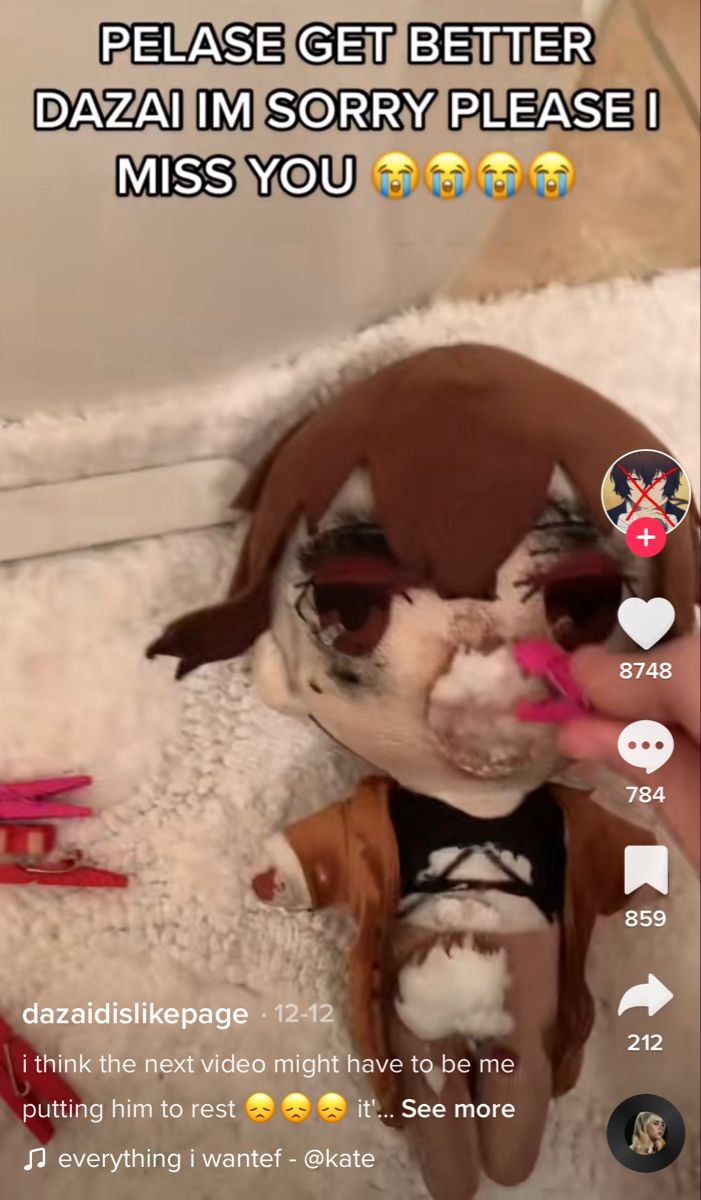 the dog is wearing sunglasses and sitting on the floor with his tongue sticking out to someone's mouth