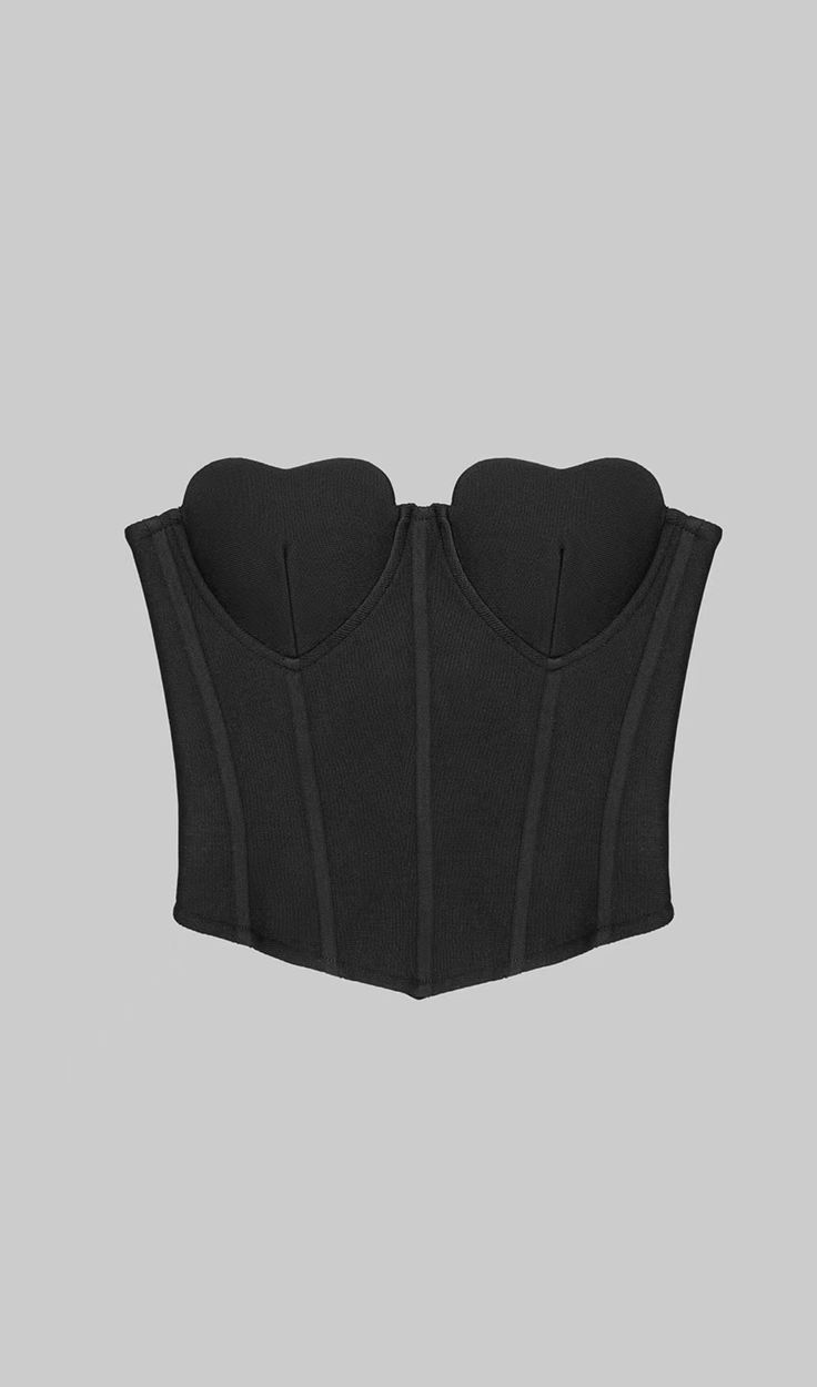 Introducing a luxurious addition to your wardrobe - the Strapless Corset Cropped Top in black. Crafted from the finest fabric, this elegant top features a corset-style bodice for a contoured, figure-hugging fit. Sophisticated and timeless, this piece exudes charisma and can easily be dressed up or down, making it the perfect must-have item for your wardrobe. Gentle Dry Clean OnlyColour may vary due to lighting on images. The product images (without model) are closest to the true colour of the pr Luxury Black Tops With Corset Back, Luxury Black Corset With Fitted Bodice, Luxury Strapless Corset With Adjustable Straps, Luxury Evening Corset With Adjustable Straps, Black Party Corset With Built-in Bra, Black Corset With Corset Back For Club, Black Corset For The Club, Black Tops With Built-in Bra And Fitted Bodice, Black Stretch Corset Dress Overbust