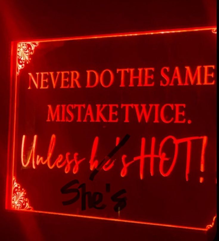 a red neon sign that says, never do the same mistke twice unless hot