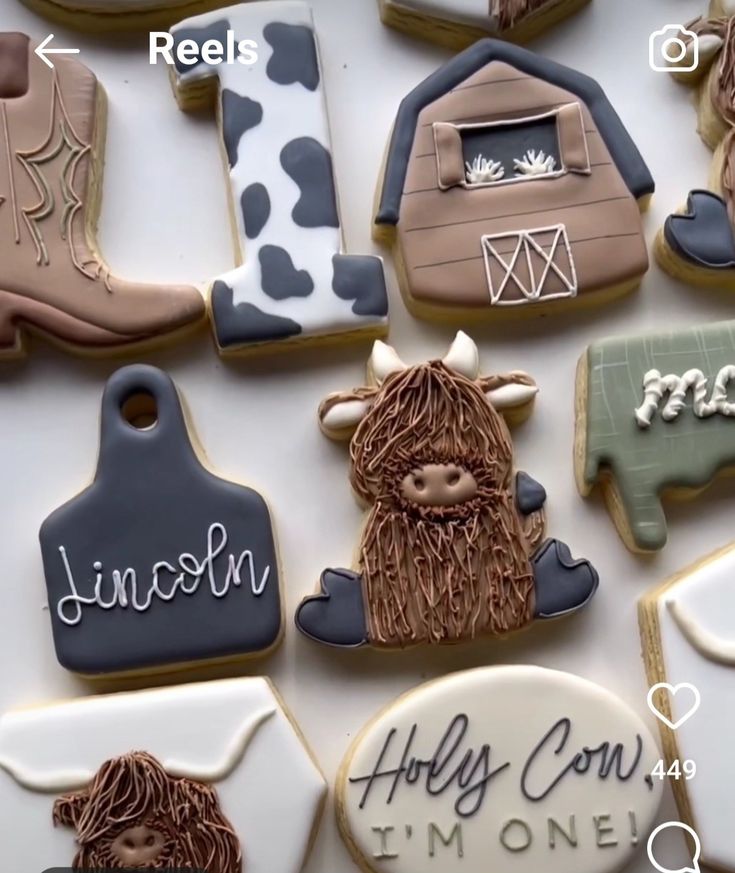 decorated cookies with farm animals and names on them