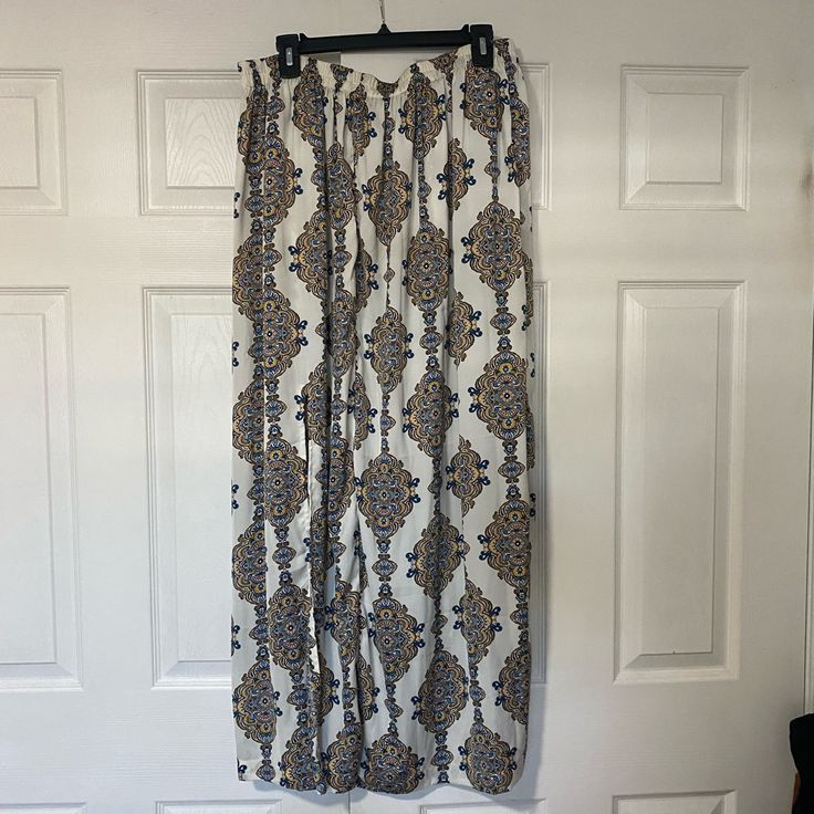 Long Printed Skirt Summer Patterned Bottoms With Lined Skirt, Chic Patterned Bottoms For Vacation, Casual Patterned Long Skirt, Patterned Long Skirt For Summer, Summer Patterned Skirt, Patterned Summer Skirt, Chic Patterned Summer Bottoms, Chic Patterned Bottoms For Summer, Wide Leg Lined Skirt For Vacation