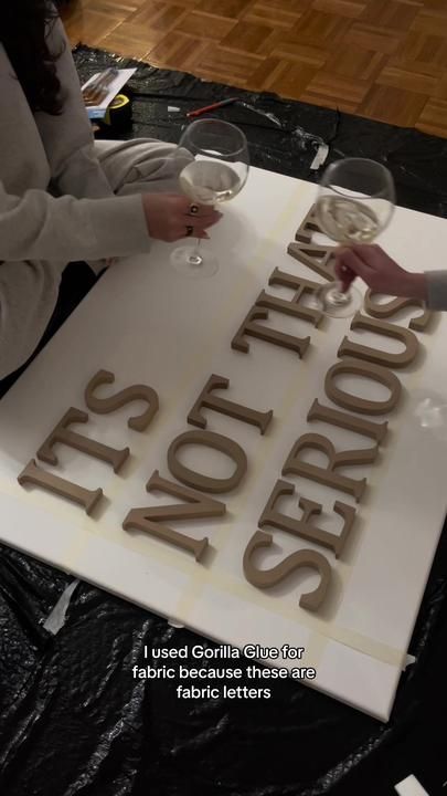 two people are standing next to a sign that says it's not the end