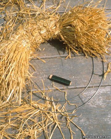 a circular object made out of hay on the ground