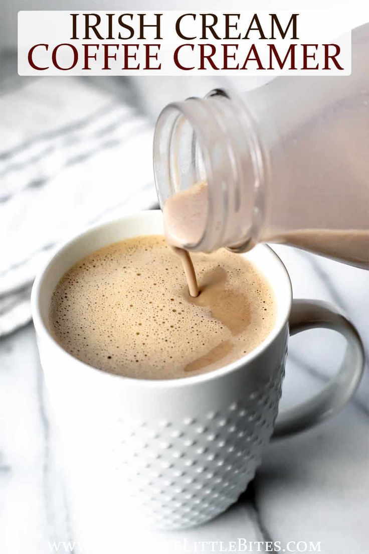 coffee being poured into a white mug with the words irish cream coffee cremer