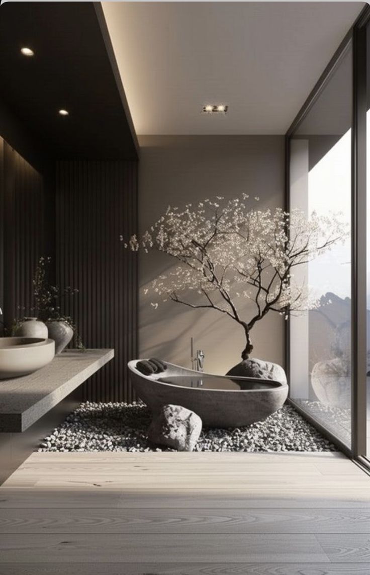 a bonsai tree is in the center of this modern bathroom with glass walls and floor to ceiling windows