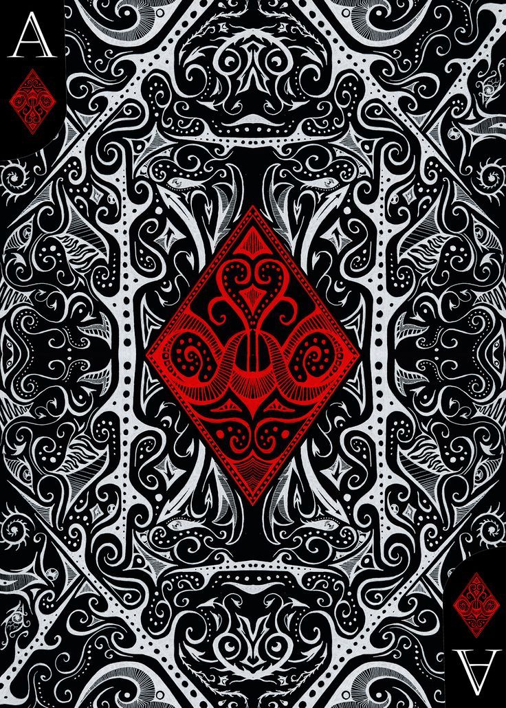 a red and black ornamental design on a black background