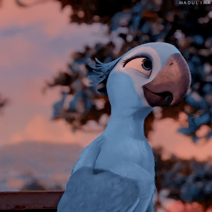 a blue and white bird standing next to a tree