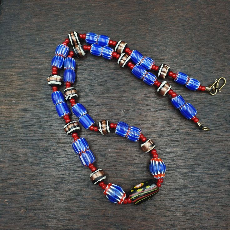 Vintage white heart Venetian Style Blue Chevron Glass Beads necklace N9-12 White Heart and Chevron Beads SIX Layer Type of Object Drawn, multi-layered glass Color BLUE, RED, White  Approximate Age Late 20th century Overall  * Condition: Good to fair.  * See picture with Size measurement tool for size comparison.  * Strand Length 22 inches (includes Lock) * Brand: East Oasis * Style: Beaded  * Type: Strand of beads Additional information: Chevron beads are the most beautiful, recogniz Oasis Style, Chevron Beads, Glass Beads Necklace, Star Mold, Object Drawing, Blue Chevron, Size Comparison, Trade Beads, Glass Color