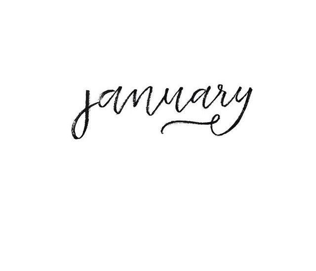 the word january written in cursive writing on a white paper with black ink