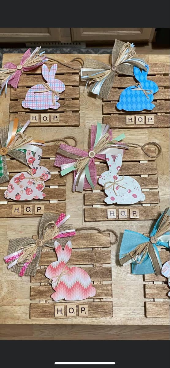 some wooden crates with different types of paper decorations on them and words that spell out the word hope