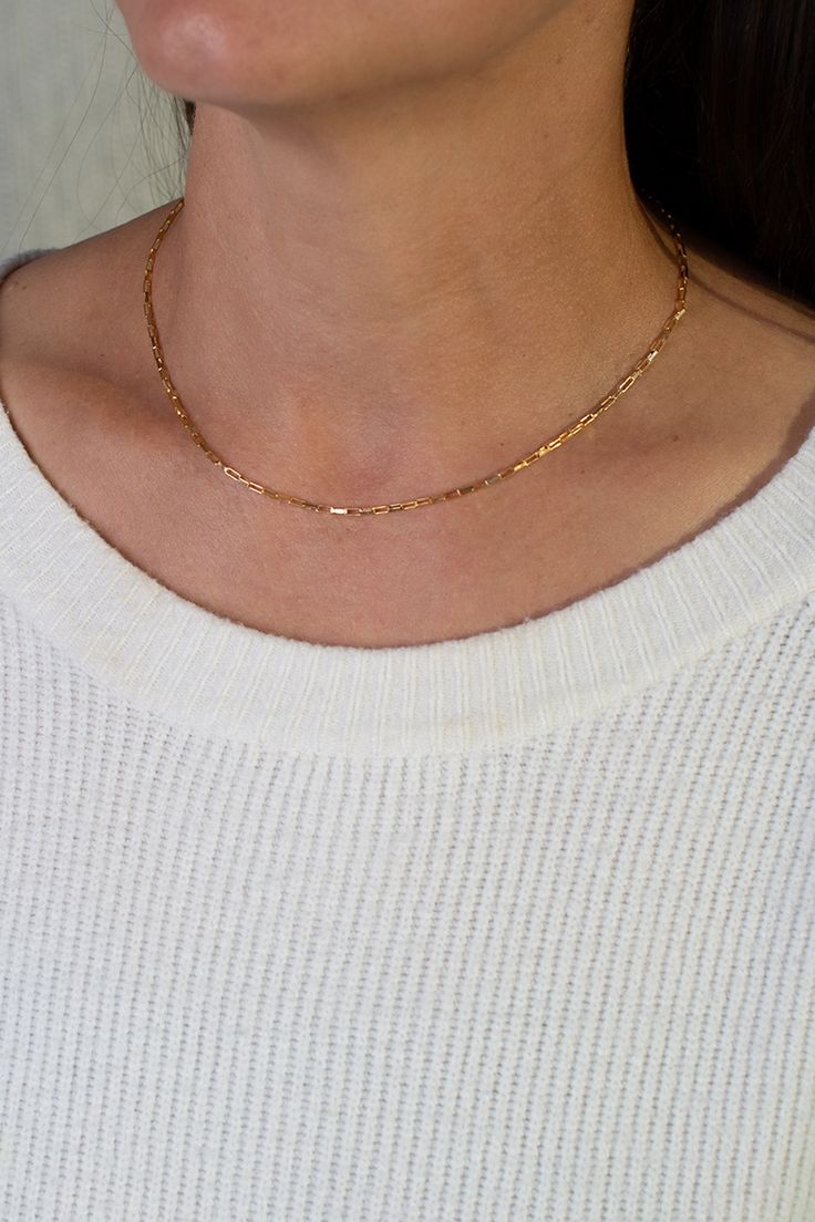 The Elements collection features our solid gold and silver chains, including this beautiful piece which utilizes our long link format in Gold. We believe this is one of the most versatile metal pieces in the collection. This necklace looks amazing all by itself or as part of a layering set. Timeless Gold Chain Link Necklace, Minimalist Gold Link Chain Necklace, Timeless Figaro Chain Necklace Gift, Timeless Figaro Chain Necklace As Gift, Minimalist Figaro Chain Necklace With Oval Links, Modern Chain Link Jewelry For Layering, Minimalist Gold Oval Link Chain Necklace, Minimalist Figaro Chain Necklaces With Oval Link, Gold Chain Necklace With Rectangular Box Links