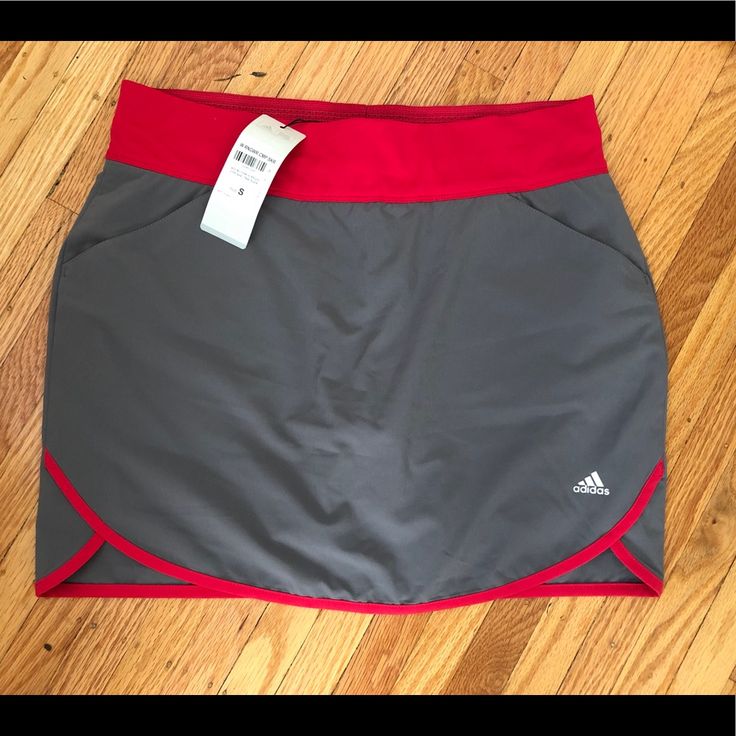 Nice Color Combo - Medium Gray And Dark Pink Waist & Trim (Pics Make It Look More Red Than Dark Pink) 2.5” Wide Waistband Front Slant Pockets Back Faux Pockets Built In Shorts Scalloped Side 14% Spandex Approx Measurements- Size S 15.5” Waist 4.75” Inseam On Innershorts 15.5” Length New W/ Tags Sporty Pink Tennis Skort, Pink Sporty Tennis Skort, Pink Sporty Skort For Sports, Red Sporty Skort For Sports, Casual Red Sports Skort, Sporty Red Skort For Sports, Sporty Pink Skort For Sports, Red Casual Sports Skort, Red Casual Skort For Sports