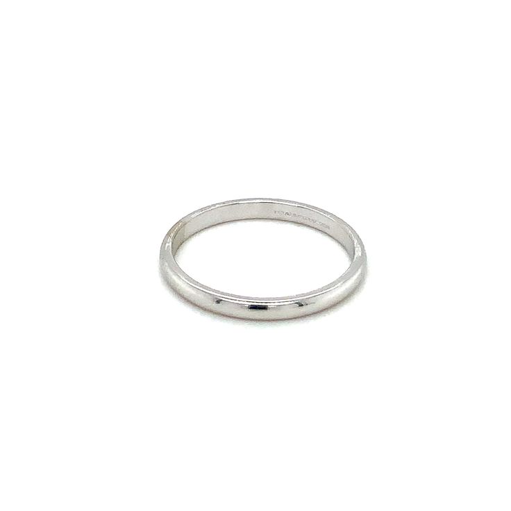 Circa 1990, this 14k White Gold Skinny Wedding Band by ArtCarved measures 2.25mm wide, thickness is 1.35mm, is a finger size 8, and weighs 2.0 grams. It has been cleaned and polished as well as freshly rhodium plated to make it look like new again. Some microscopic scratches and dings may still persist to the aided eye. Stamped 14k and Hallmarked inside. The overall condition is good! ERA - Circa 1990, Modern Vintage METAL / MATERIAL - 14k White Gold MARKINGS / HISTORY - 14k The tradition of exc Anniversary Bands With Polished Edges, Formal Jewelry With Polished Edges In Round Band, Wedding Bands With Polished Edges, Polished Finish Round Band For Anniversary, Minimalist Platinum Round Band Jewelry, Minimalist Round Band Platinum Jewelry, Minimalist Platinum Jewelry With Round Band, Classic Jewelry With Shiny Finish For Anniversary, Wedding Jewelry With Polished Edges Thick Band