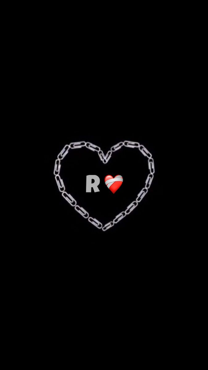 a heart with the letter r on it is chained to a chain that has been placed in the shape of a heart