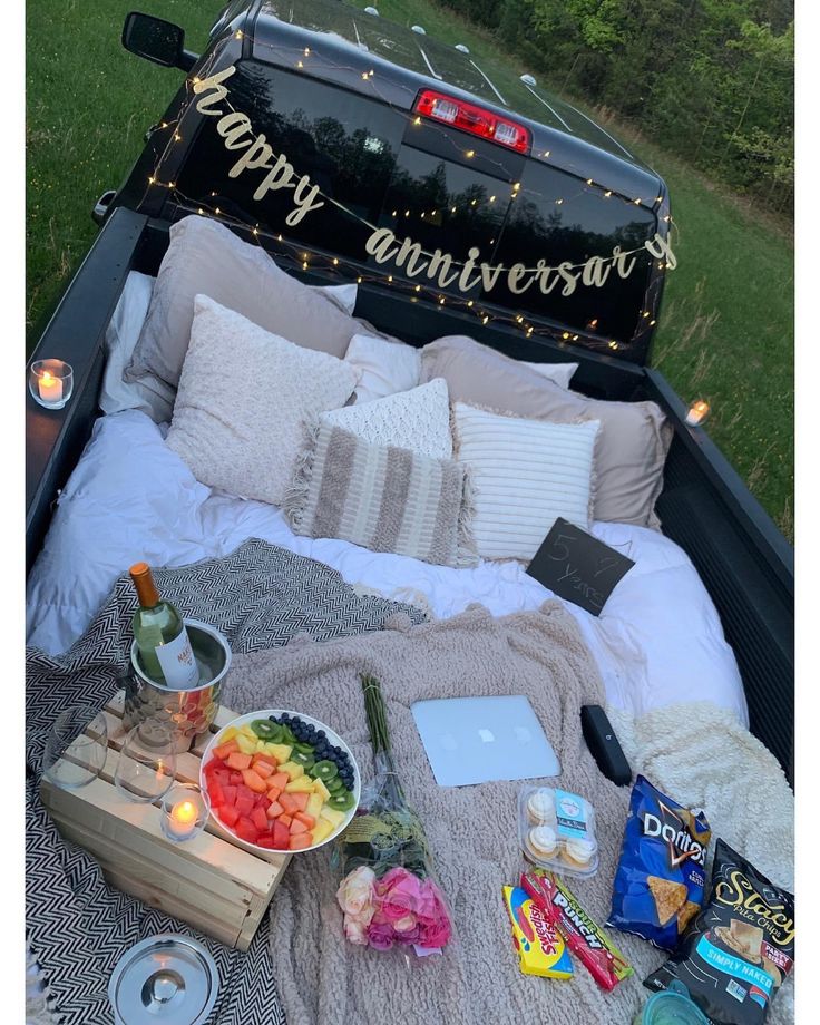 an open truck bed filled with food and drinks