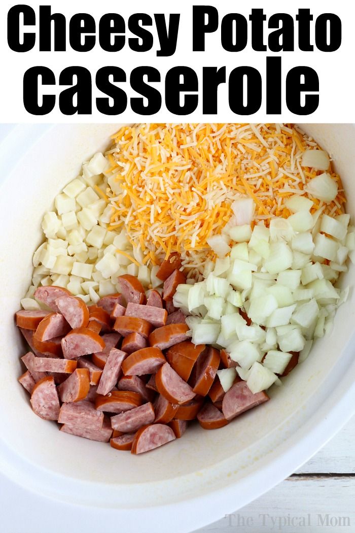 the ingredients for cheesy potato casserole in a white bowl with text overlay