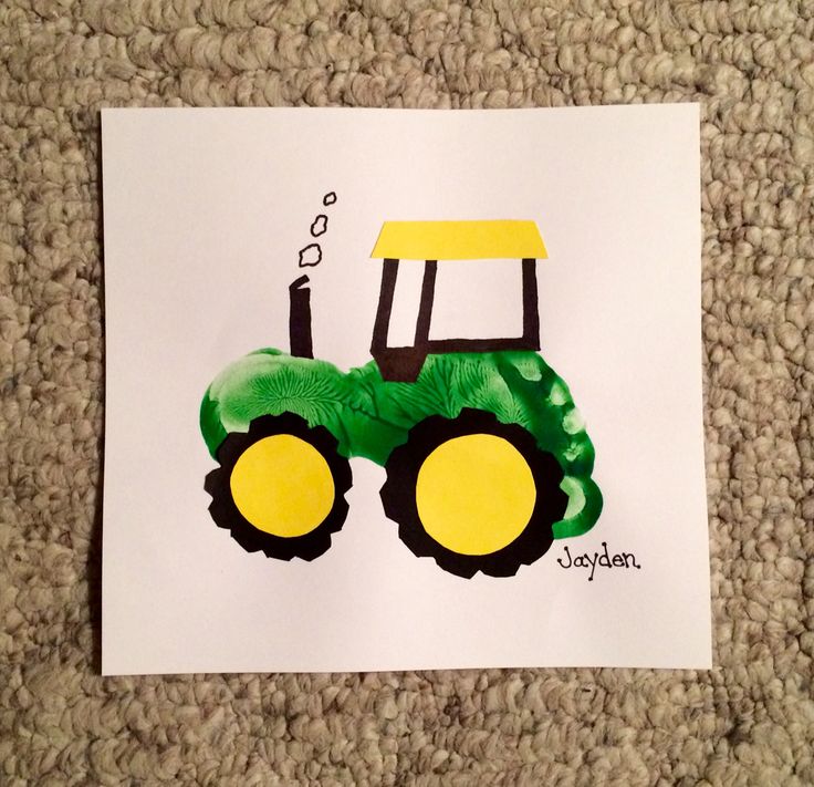 a paper cut out of a tractor on the ground