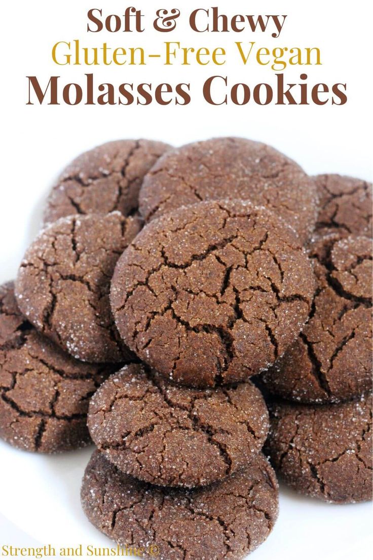 soft and chewy gluten - free vegan molasses cookies on a white plate