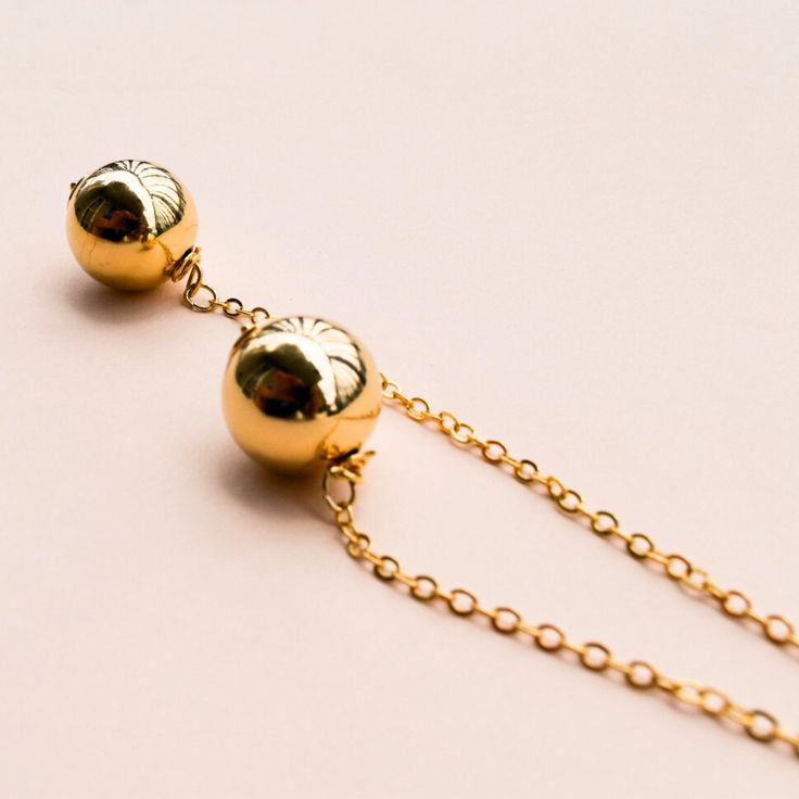 Spherical jewelry has always carried positive symbolism in history, like eternity and unity, and will continue to bring joy to those who wear this beautiful lariat. This beautiful Lariat is 18 karat gold plated, and 30 inches in length. Holiday Sales, Jewelry Pieces, Gold Necklace, Gold Plate, Plating, Gold