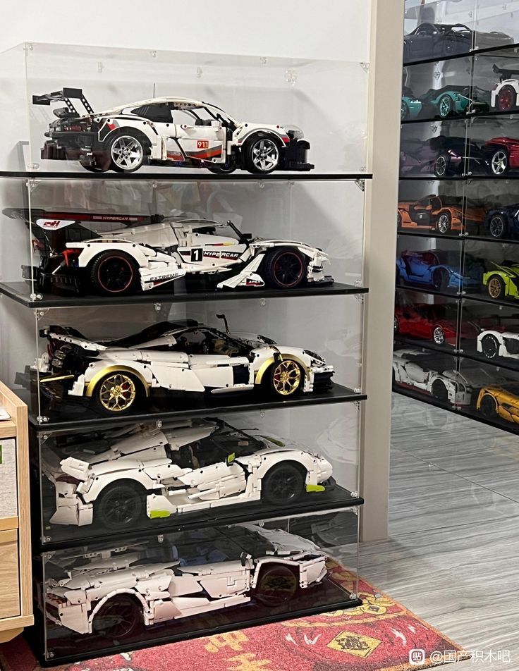 a display case filled with lots of toy cars