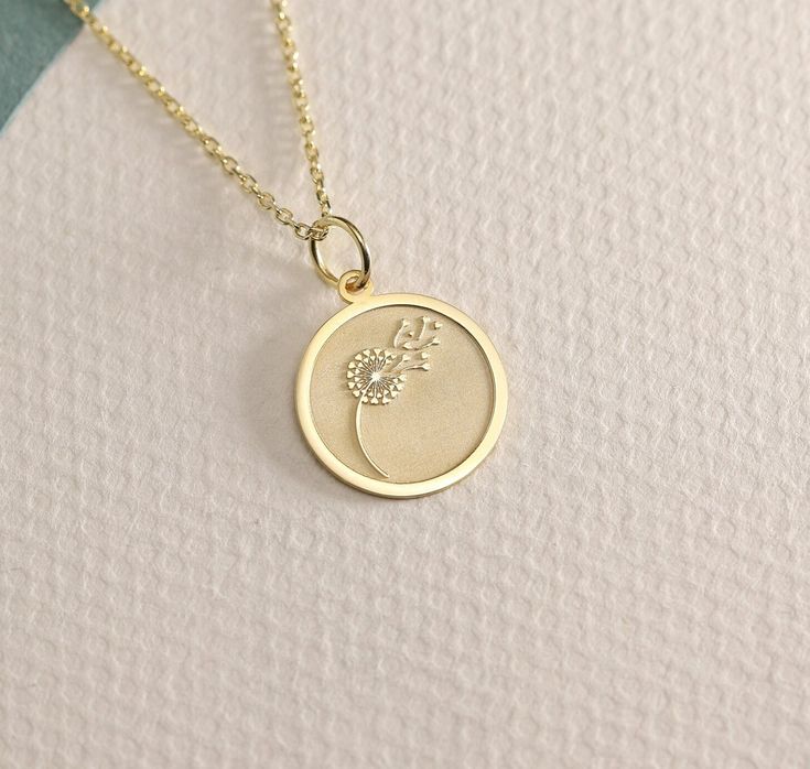 14K Real Solid Gold  Dandelion necklace ● Material of pendant: Solid Gold 14k ( REAL GOLD ) ● Metal Stamp: 14L ( REAL GOLD ) ● The pendant is available in 6 sizes: - 14,0 mm / 0,55 inches ( Diameter ) In the photos - 15,3 mm / 0.60 inches ( Diameter ) - 16,5 mm / 0,65 inches ( Diameter ) - 19,1 mm / 0,75 inches ( Diameter ) - 21 mm / 0,82 inches ( Diameter ) - 23 mm / 0.90 inches ( Diameter ) ( In the photos the size is 14mm / 0.55 inches Diameter ) ( Jump Ring inner diameter: 4 mm ) ● Material Dandelion Necklace, We Can Do It, Necklace Personalized, Gold Charm, Jump Rings, Gold Style, Metal Stamping, Real Gold, Pendant Necklaces