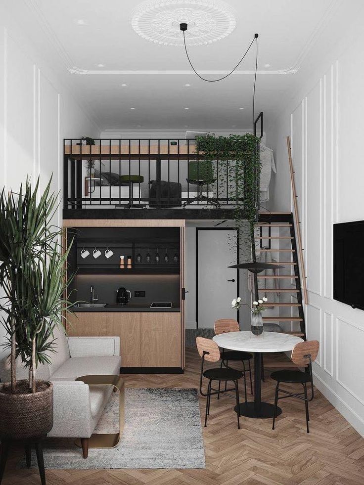 a living room filled with furniture and a loft bed