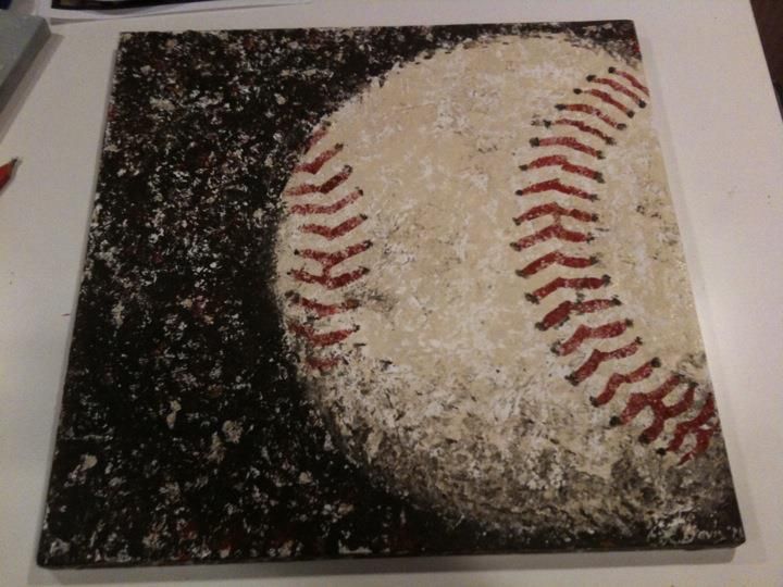 an image of a baseball that is on the table with crumbs all over it