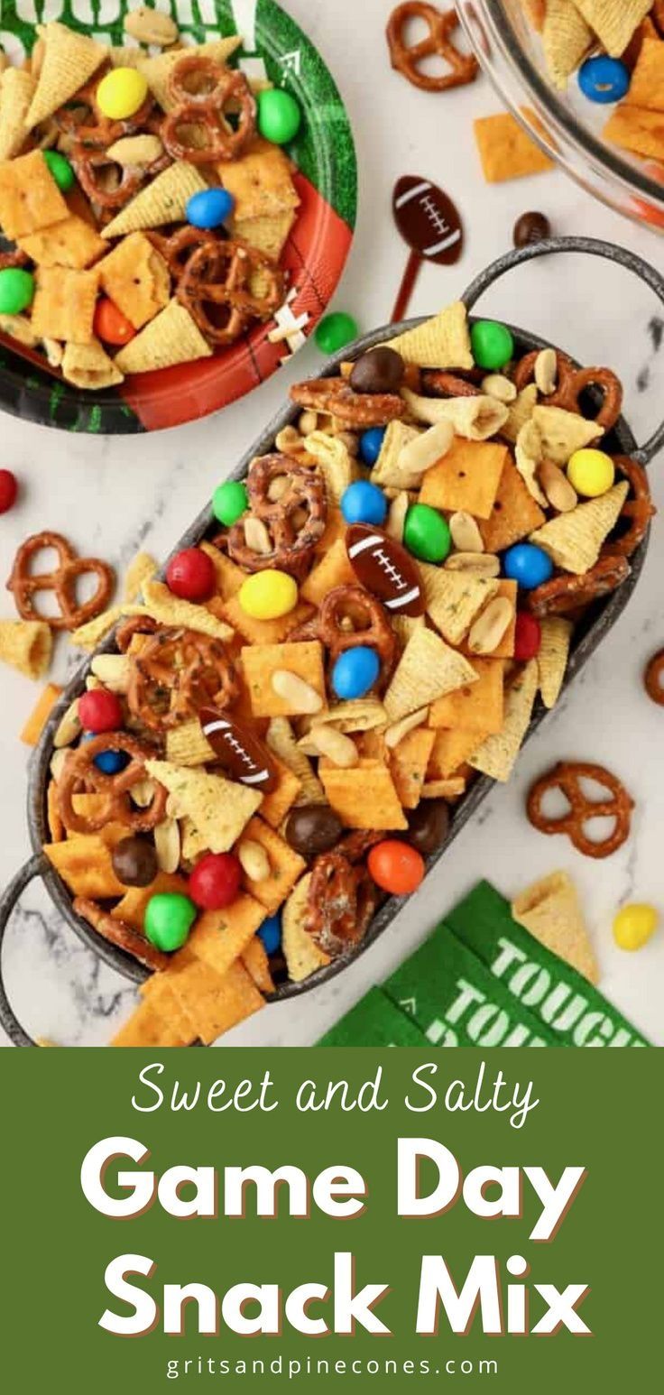 two bowls filled with candy and salty game day snack mix on top of a table