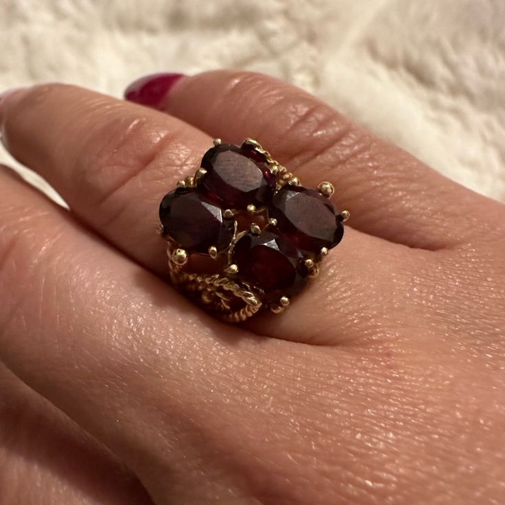 Beautiful Real Garnet Ring In 10k Gold. This Is Vintage , It Has Nice Details On The Side Of The Ring.. Luxury Garnet Rings Hallmarked, Elegant Multi-stone Garnet Rings, Formal Garnet Rings Fine Jewelry, Luxury Hallmarked Garnet Rings, Formal Garnet Gemstone Cluster Ring, Yellow Gold Garnet Cluster Ring As Gift, Luxury Garnet Wedding Jewelry, Elegant Multi-stone Ruby Open Ring, Elegant Multi-stone Open Ruby Ring