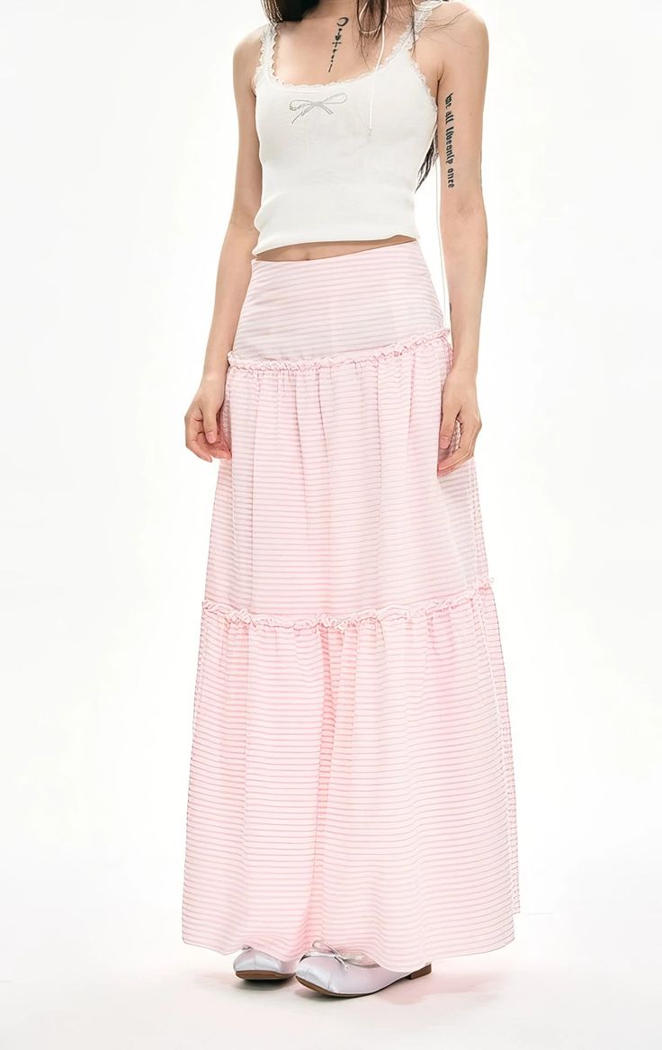 Embrace the whimsical allure of the Striped Ruffle Hem Maxi Skirt, a perfect blend of charm and versatility.
This elegant A-line skirt features a high waist design, crafting a flattering silhouette that elongates the legs. Made from 100% polyester fiber, it offers durable wear while maintaining a graceful flow. The playful stripes and ruffle hem add a retro-inspired twist, while the full length promises to sway with your every step.
Its effortless style is ideal for everything from weekend brunc Maxi Rok, Ruffle Hem, Retro Inspired, A Line Skirt, A Line Skirts, Effortless Style, Maxi Skirt, Full Length, High Waist