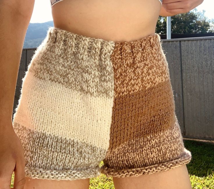 a close up of a person wearing shorts with knitted material on the bottom and sides